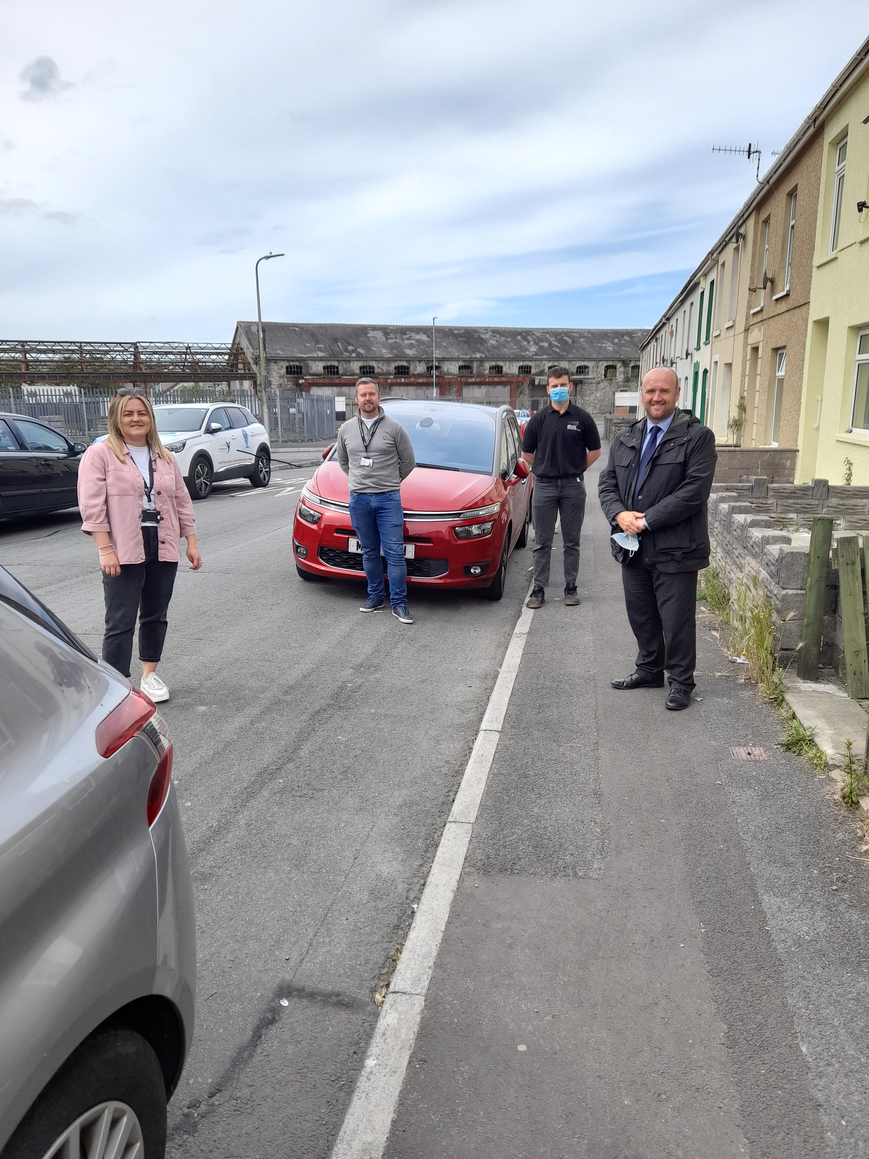 Picture: Police and Crime Commissioner, Dafydd Llywelyn with local Officers and Wardens visiting residents in Llanelli town centre as part of the Safer Streets initiative.